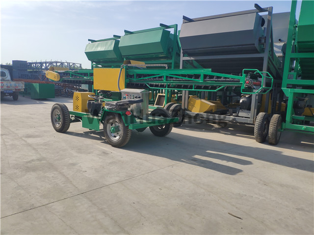 Mobile automobile bulk grain side unloader