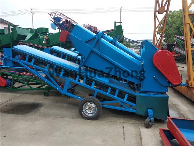 Mobile multi-function grain loading scraper