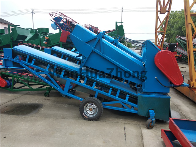 Mobile multi-function grain loading scraper