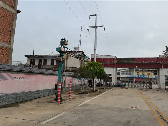 Fixed grain truck probe in the grain depot
