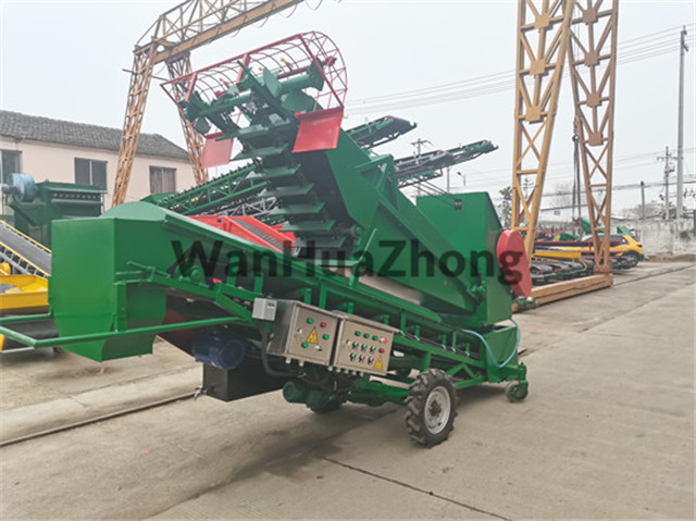 Mobile multi-function grain loading scraper