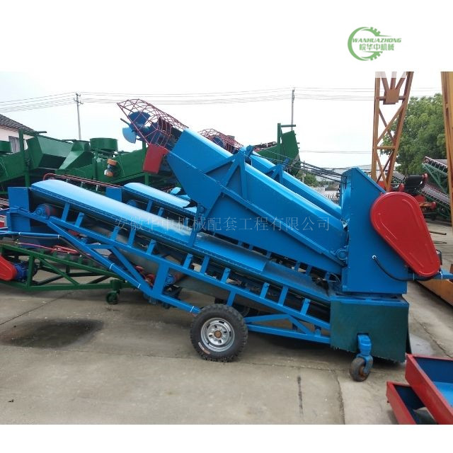 On site picture of mobile multi-function grain loading scraper