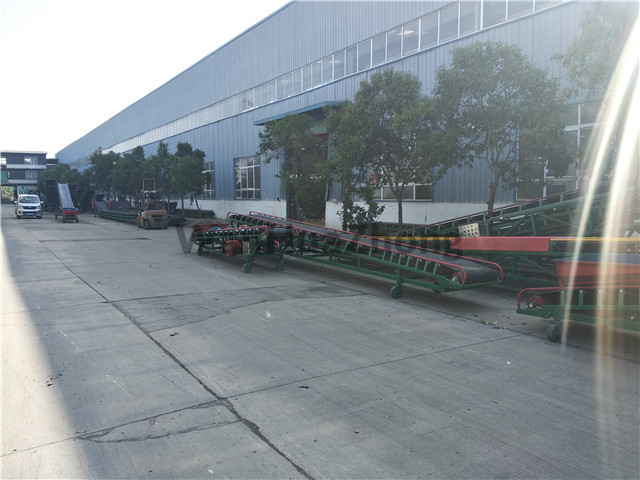Mobile horizontal belt conveyor in factory